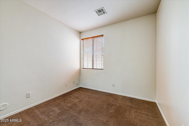 12775 W Lowden Rd, Peoria, AZ 85383 - unfurnished room with dark carpet and baseboards
