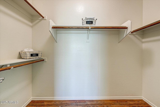 12775 W Lowden Rd, Peoria, AZ 85383 - spacious closet featuring wood finished floors