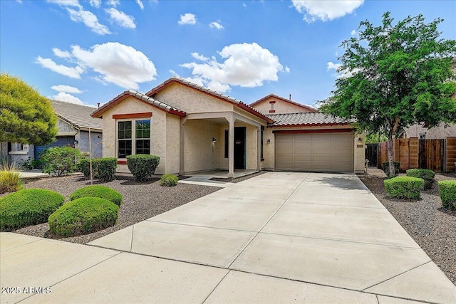 12775 W Lowden Rd, Peoria, AZ 85383 - view of front of property featuring stucco siding, a garage, driveway, and a tile roof