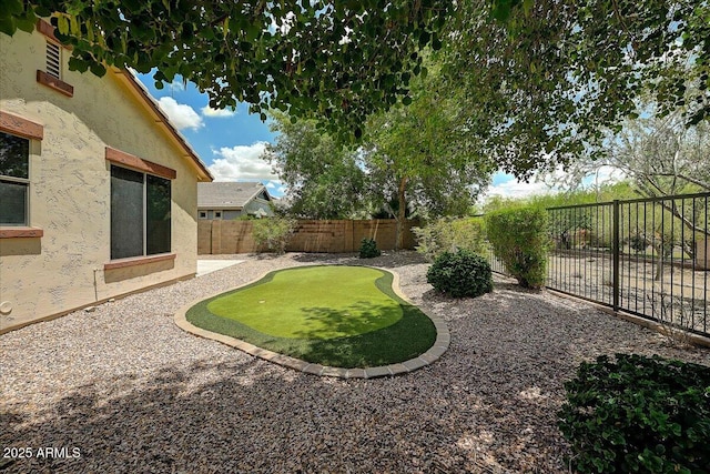12775 W Lowden Rd, Peoria, AZ 85383 - fenced backyard featuring a putting green