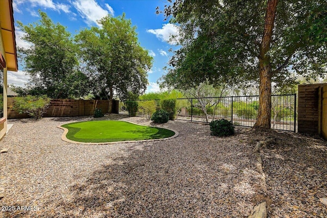 12775 W Lowden Rd, Peoria, AZ 85383 - fenced backyard featuring an area to practice putting