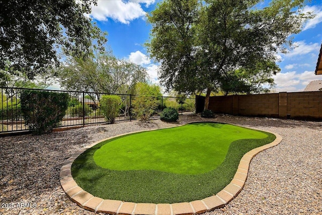 12775 W Lowden Rd, Peoria, AZ 85383 - fenced backyard featuring a putting green