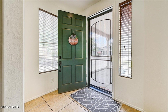 12775 W Lowden Rd, Peoria, AZ 85383 - entrance foyer featuring baseboards and light tile patterned flooring