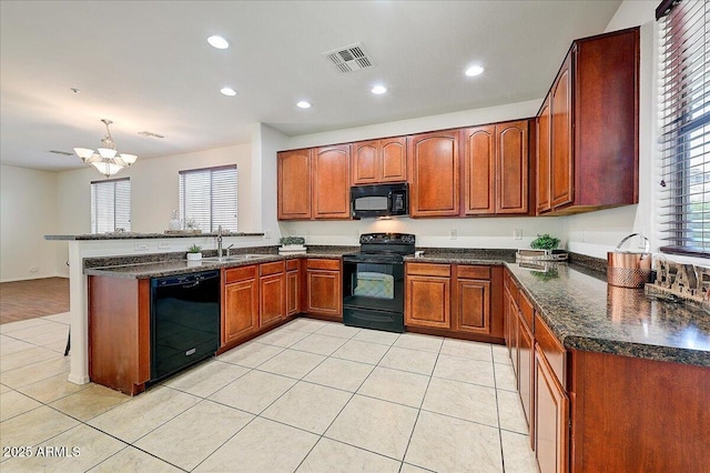 12775 W Lowden Rd, Peoria, AZ 85383 - kitchen with black appliances, a sink, a peninsula, recessed lighting, and a chandelier
