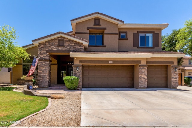 723 E Gemini Pl, Chandler, AZ 85249 - view of front of property featuring stone siding, a garage, driveway, and stucco siding