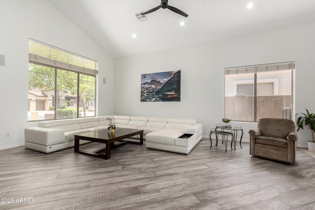 723 E Gemini Pl, Chandler, AZ 85249 - living area with a ceiling fan, wood finished floors, recessed lighting, and high vaulted ceiling
