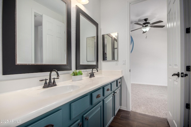 723 E Gemini Pl, Chandler, AZ 85249 - bathroom with double vanity, ceiling fan, and wood finished floors