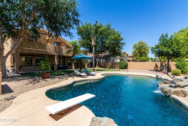 723 E Gemini Pl, Chandler, AZ 85249 - view of pool with a patio area, a diving board, and a fenced backyard