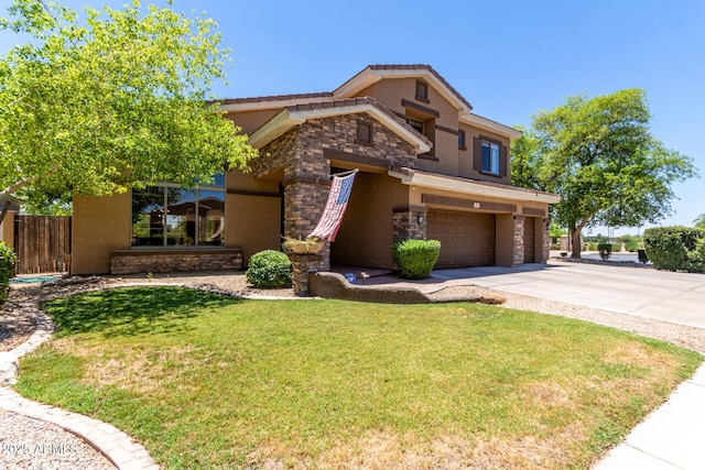 723 E Gemini Pl, Chandler, AZ 85249 - view of front facade with stucco siding, an attached garage, driveway, and stone siding