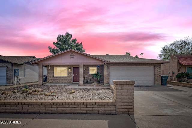 ranch-style home with a garage