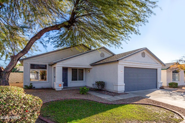 ranch-style home featuring a garage