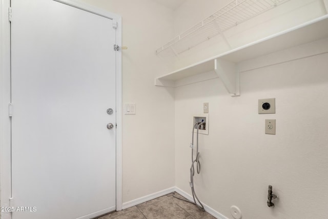 clothes washing area featuring washer hookup, gas dryer hookup, electric dryer hookup, and light tile patterned flooring