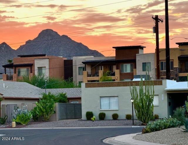 outdoor building at dusk featuring a mountain view