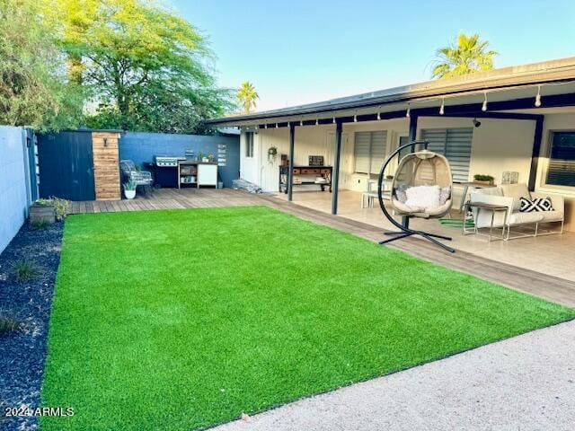 view of yard with a patio area