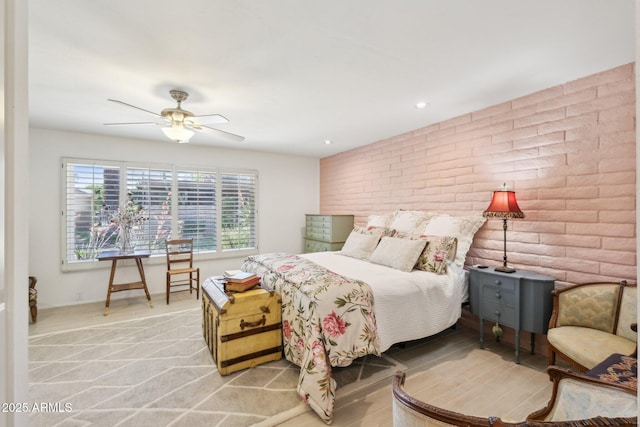 4800 N 68th St Unit 357, Scottsdale, AZ 85251 - bedroom with brick wall, a ceiling fan, and recessed lighting