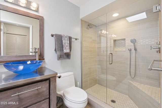4800 N 68th St Unit 357, Scottsdale, AZ 85251 - bathroom with a shower stall, toilet, and vanity