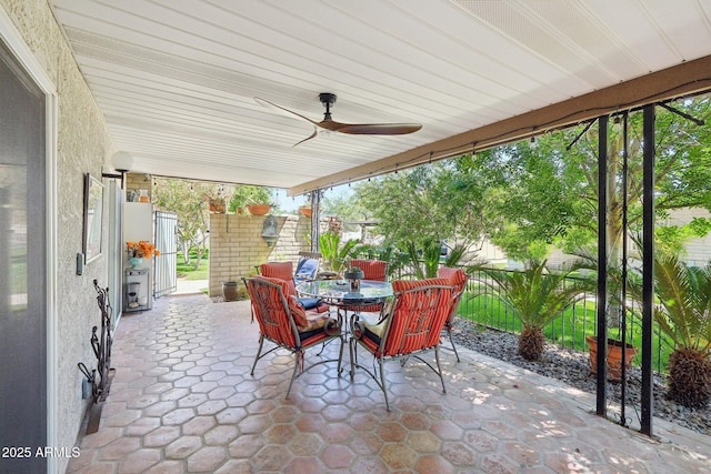 4800 N 68th St Unit 357, Scottsdale, AZ 85251 - view of patio with outdoor dining space, a ceiling fan, and fence