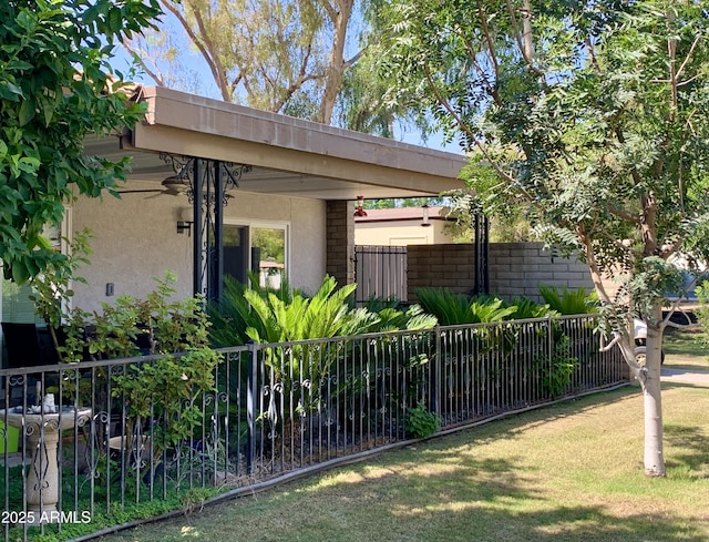 4800 N 68th St Unit 357, Scottsdale, AZ 85251 - view of property exterior featuring fence and stucco siding