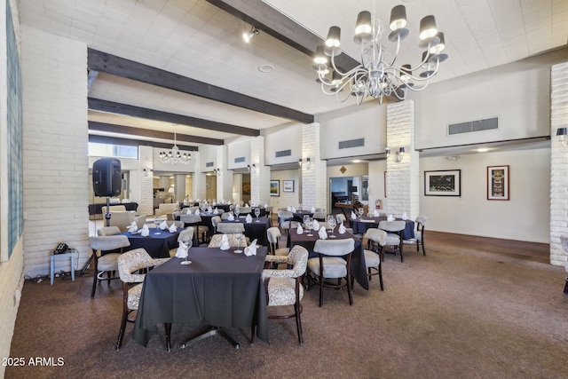 4800 N 68th St Unit 357, Scottsdale, AZ 85251 - carpeted dining space with a chandelier, beam ceiling, and baseboards