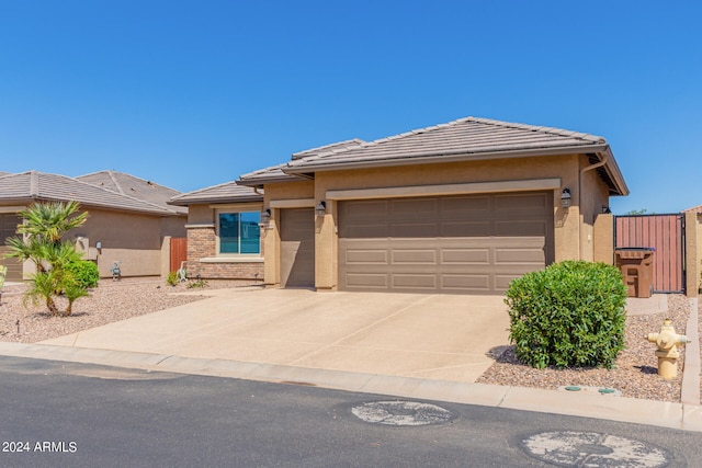 prairie-style house featuring a garage