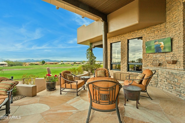 view of patio / terrace with a mountain view