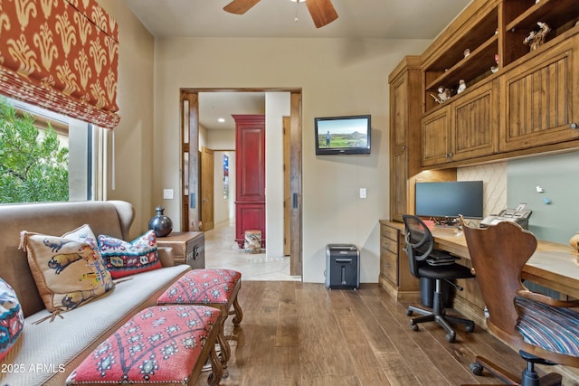 office featuring light hardwood / wood-style flooring and ceiling fan