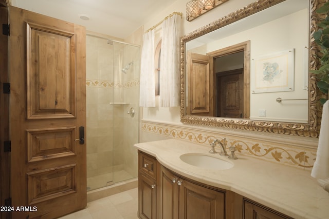 bathroom featuring vanity and walk in shower