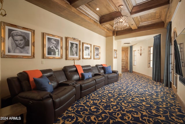 carpeted home theater room with coffered ceiling, crown molding, and beamed ceiling