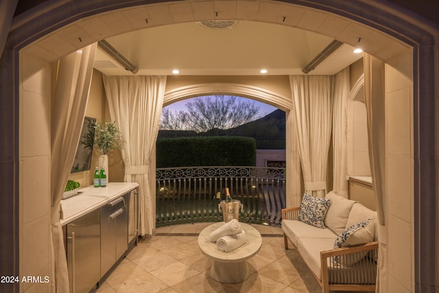 view of patio terrace at dusk