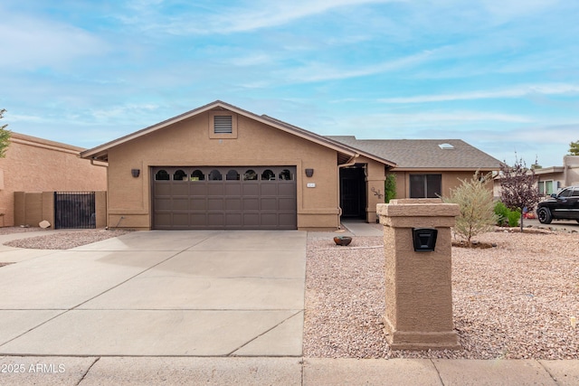 single story home with a garage