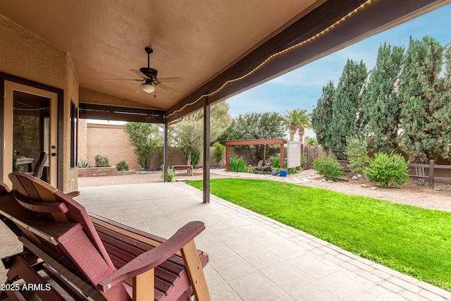 view of patio / terrace featuring ceiling fan and a pergola