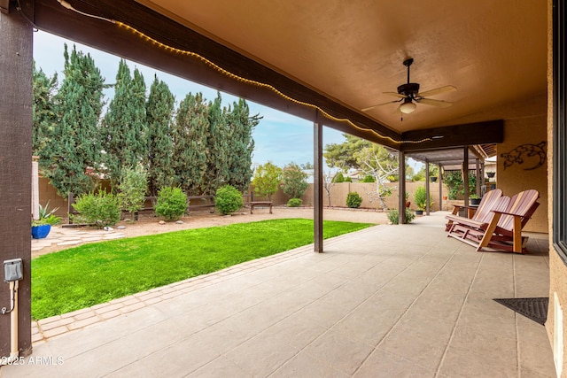 view of patio / terrace featuring ceiling fan