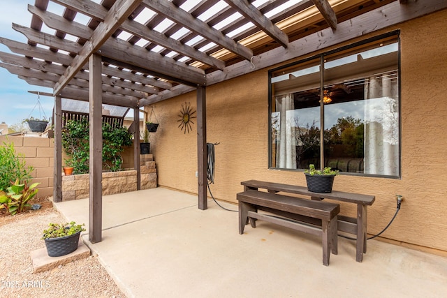 view of patio / terrace featuring a pergola