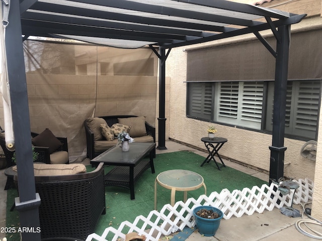 view of patio / terrace with an outdoor hangout area and a pergola