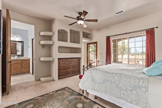 380 N Geneva Estates Rd, Pearce, AZ 85625 - bedroom with light tile patterned floors, access to outside, ensuite bath, and ceiling fan