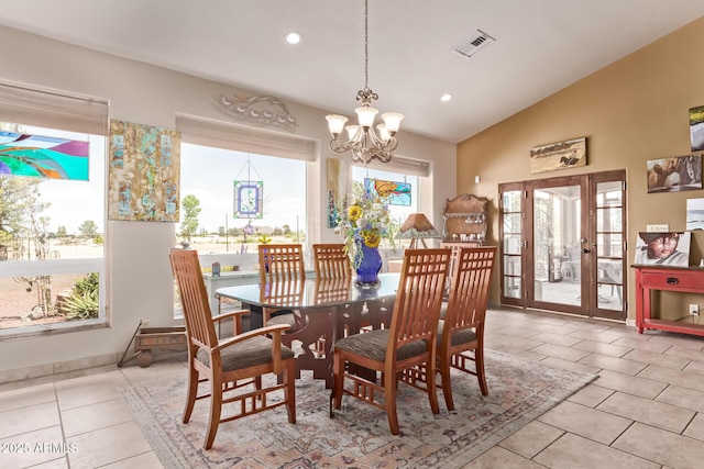 380 N Geneva Estates Rd, Pearce, AZ 85625 - tiled dining space featuring a chandelier, vaulted ceiling, recessed lighting, and french doors