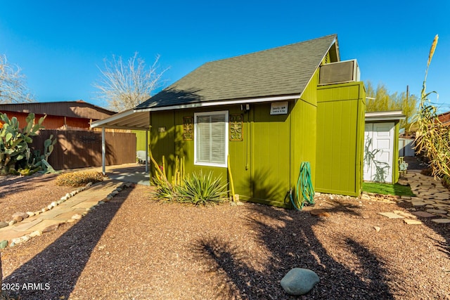 view of front of property with a carport