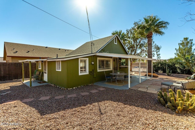 back of house with a patio area