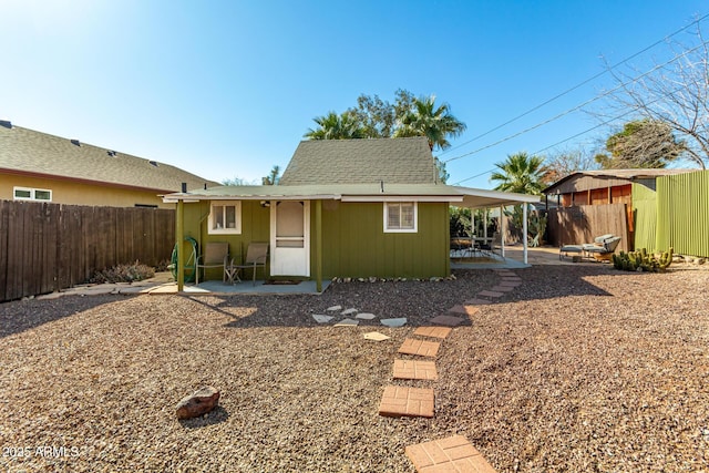 rear view of house featuring a patio area