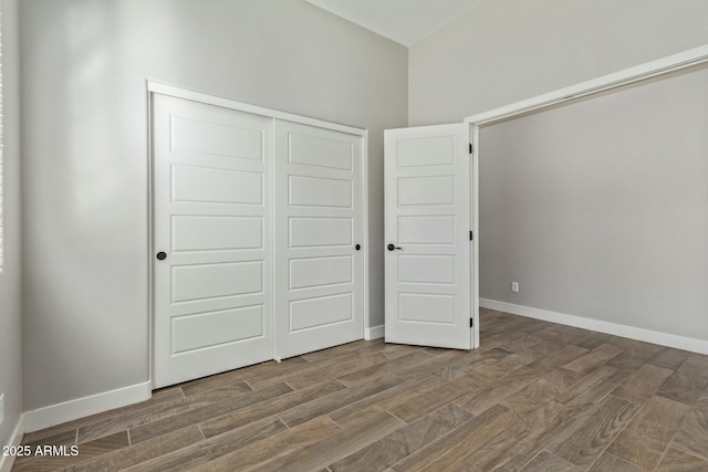 unfurnished bedroom with a closet