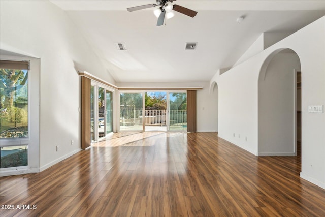 unfurnished living room featuring lofted ceiling, ceiling fan, and dark hardwood / wood-style floors