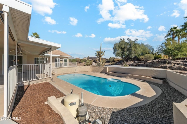 view of swimming pool featuring a patio