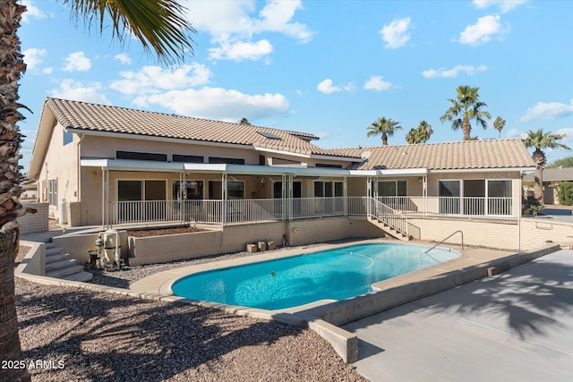 view of pool featuring a patio