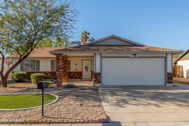 single story home with a garage