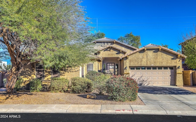 view of front of property featuring a garage