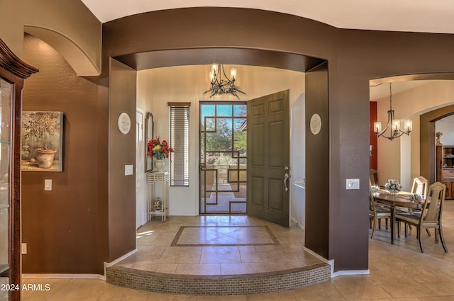 entrance foyer featuring a chandelier