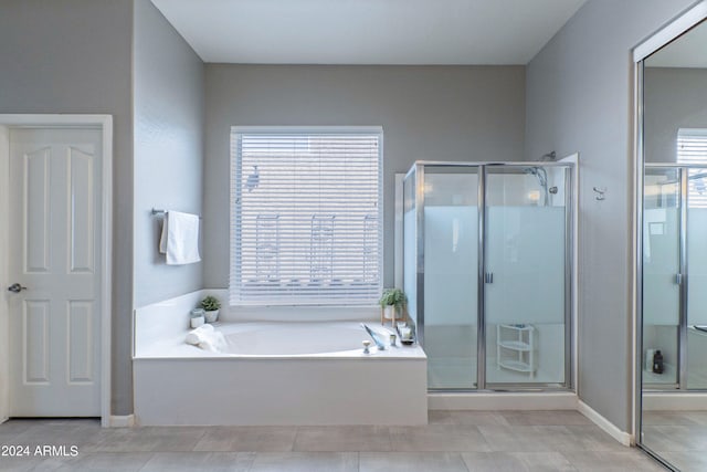 bathroom with independent shower and bath