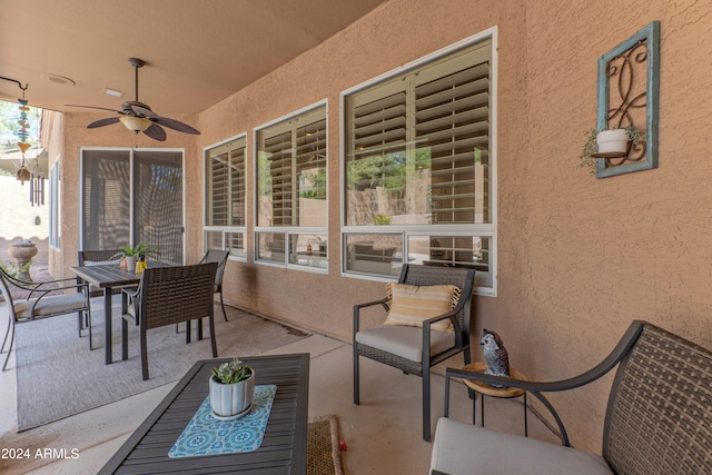 view of patio featuring ceiling fan