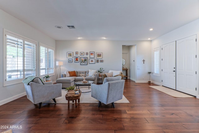 living room featuring dark hardwood / wood-style floors