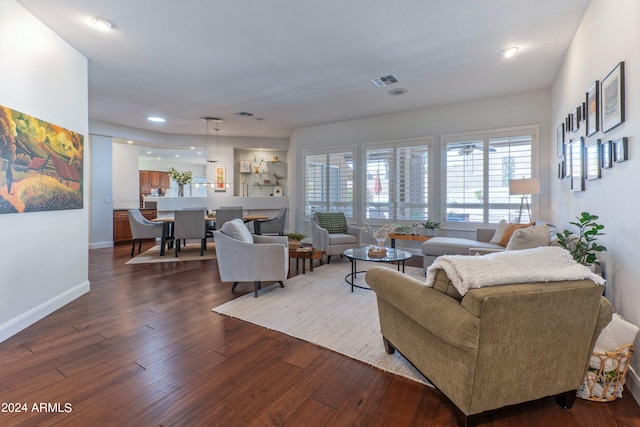 living room with dark wood-type flooring